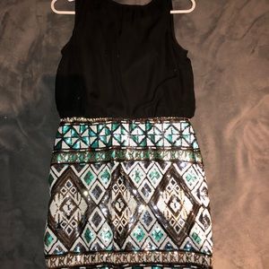 A black and glittery dress